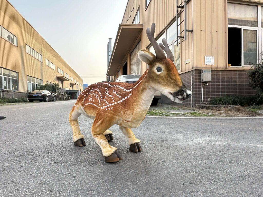 Hire a baby reindeer hire robot reindeer hyperrealistic reindeer Christmas event things to do christmas entertainment amazing lifelike